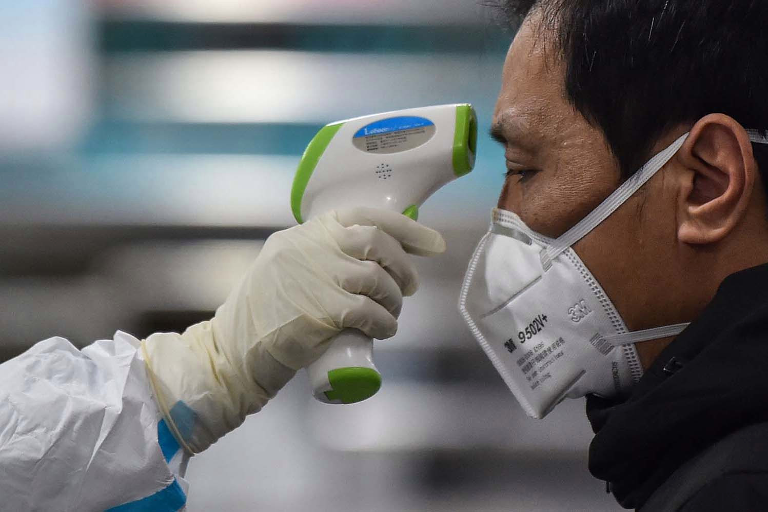 Wuhan China outbreak coronavirus temperature GettyImages 1196116329